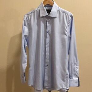 Men’s blue broad collar dress shirt.